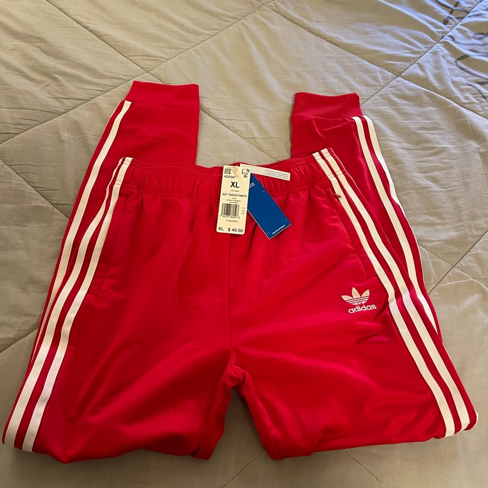 Boys red adidas joggers pants